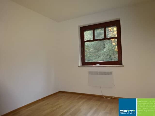 Bright ground floor apartment with balcony and parking