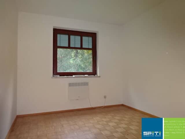 Bright ground floor apartment with balcony and parking