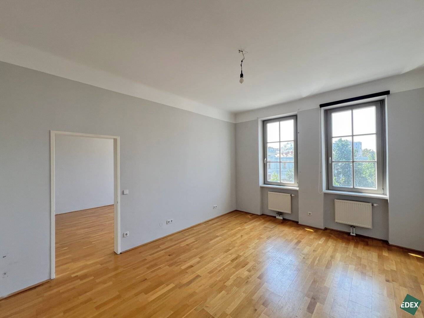 High ceilings, large windows, communal terrace