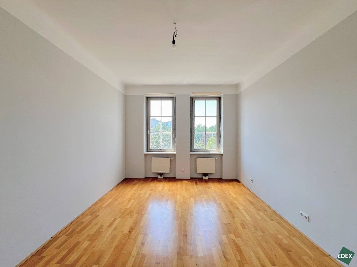 High ceilings, large windows, communal terrace