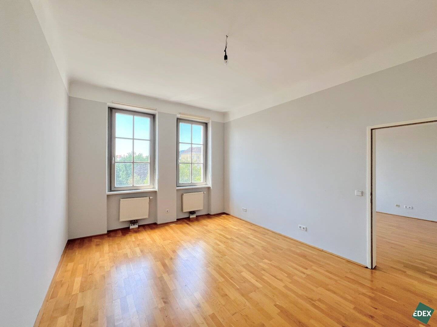 High ceilings, large windows, communal terrace