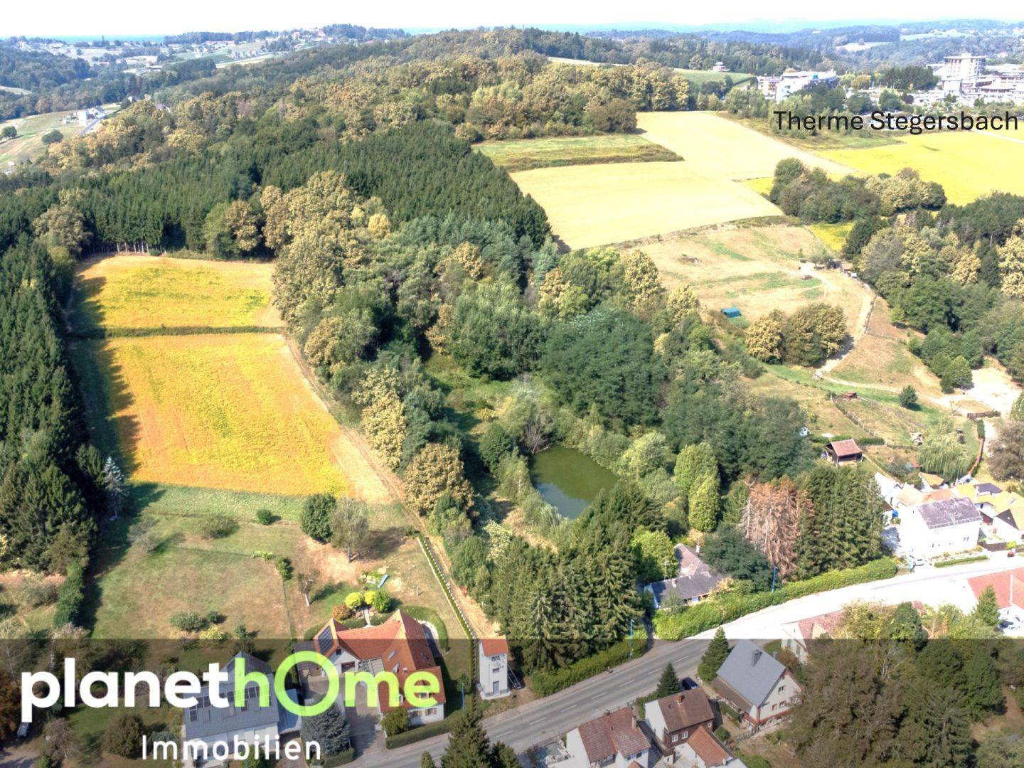 Einfamilienhaus mit Fischteich und Seeblick