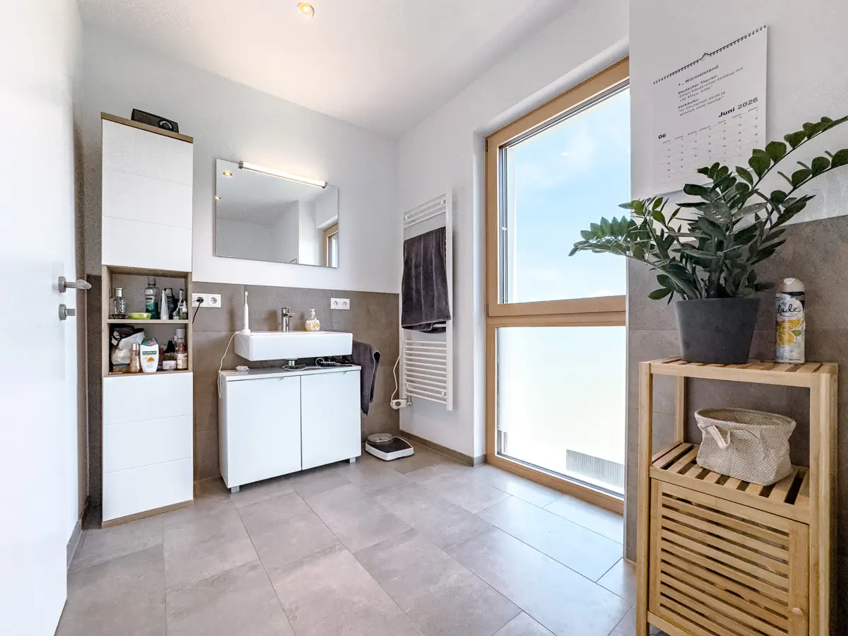 New build apartment with balcony and underground parking in quiet location