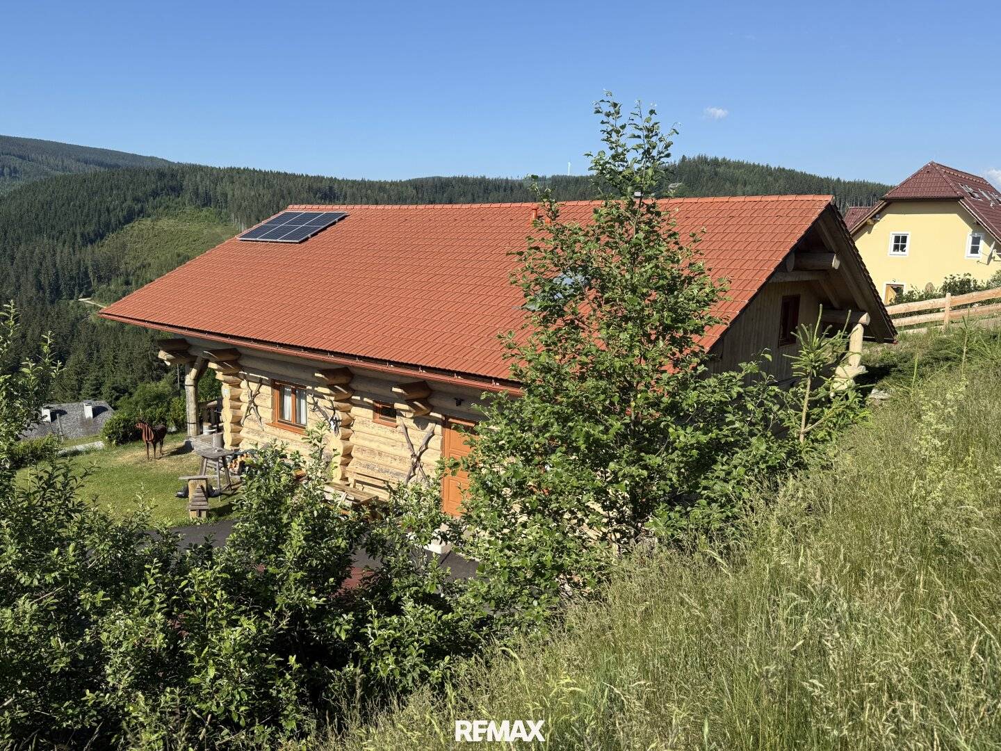 Log house with balcony and veranda in Alpl