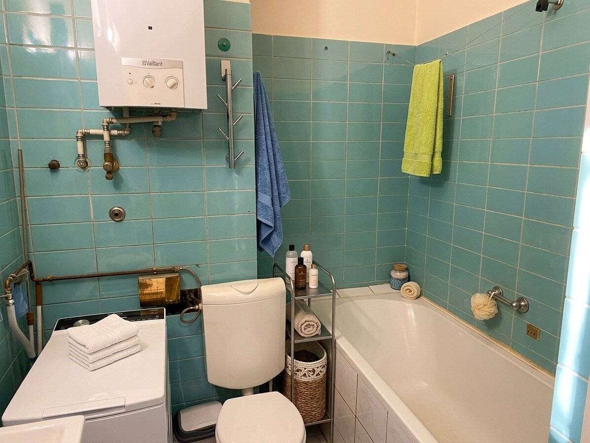 Renovation-Ready Altbau Apartment on Upper Ground Floor with Elevator