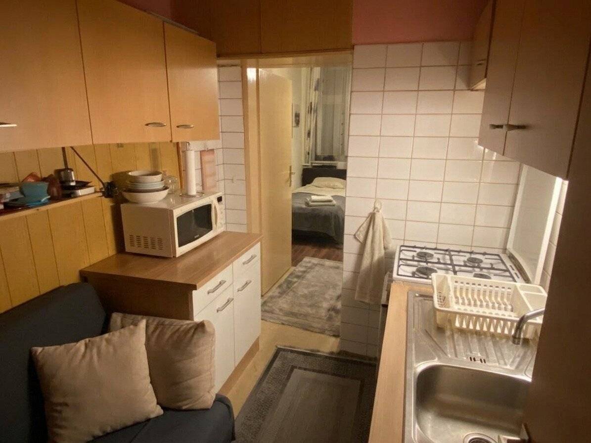 Renovation-Ready Altbau Apartment on Upper Ground Floor with Elevator