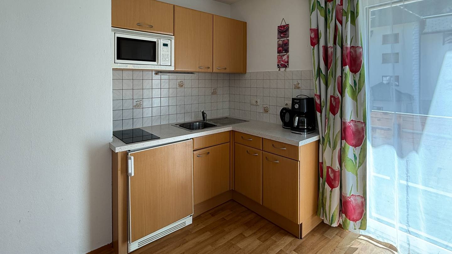 Saniertes Penthouse mit Balkon und Bergblick