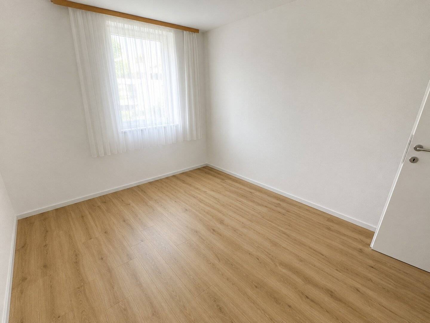 Erdgeschosswohnung mit Einbauküche und Kellerabteil