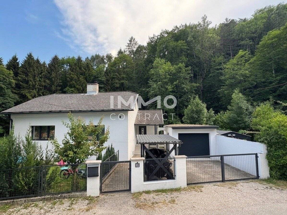 Einfamilienhaus mit Terrasse und Grünblick am Waldrand