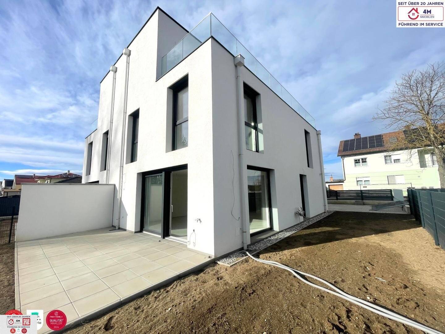 Einfamilienhaus mit Garten und zwei Terrassen in ruhiger Lage