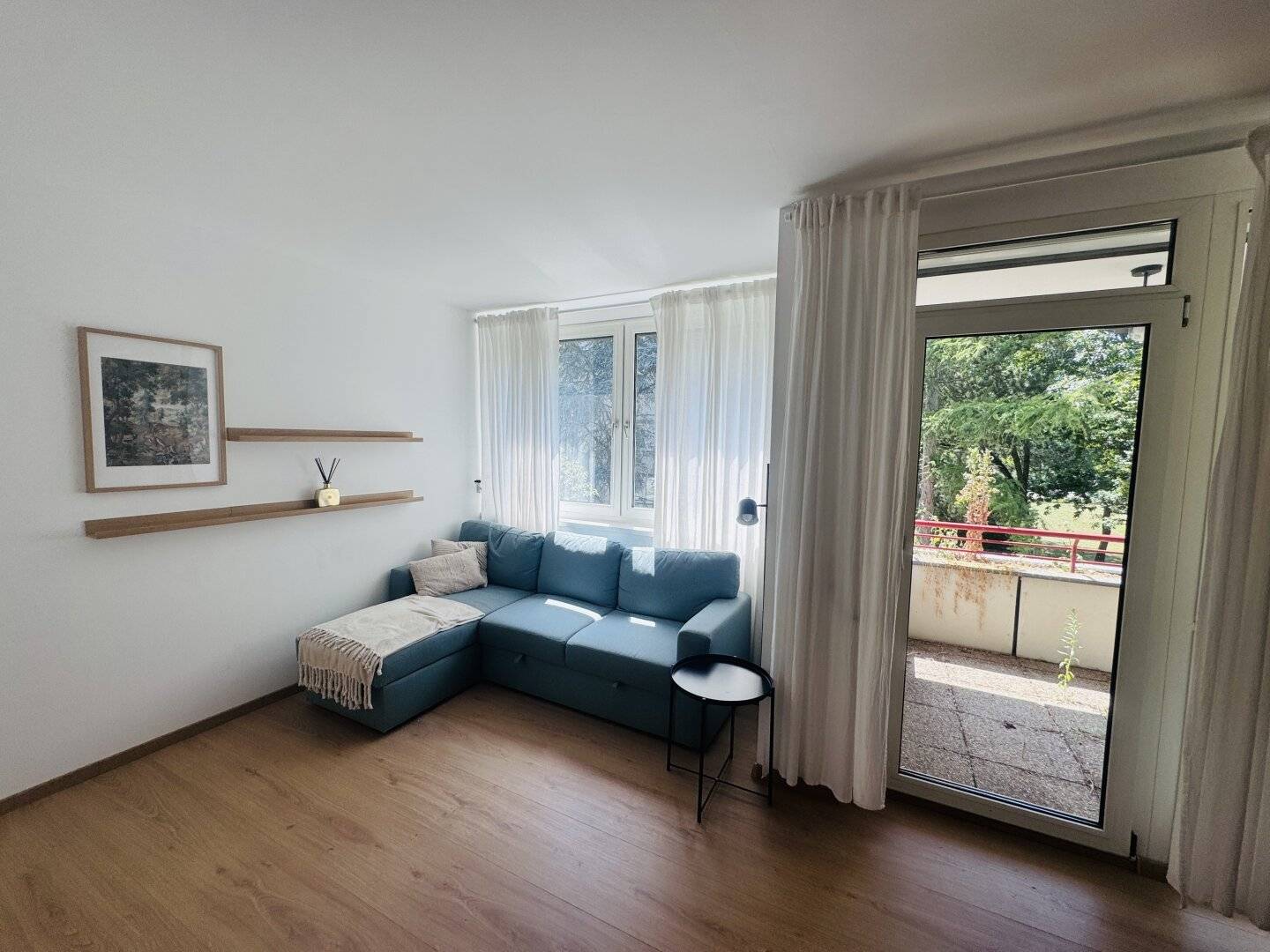 Bright 2-room new build apartment with terrace and parking in a quiet green location