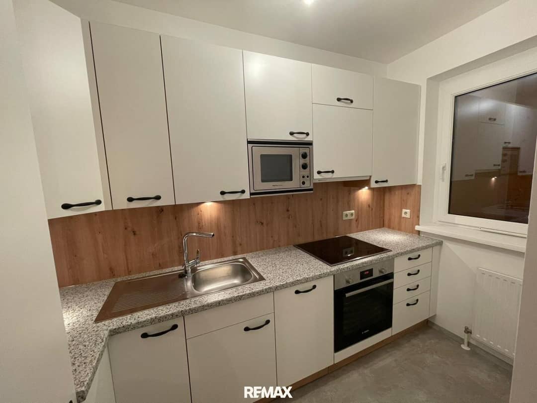 Wohnung mit verglaster Loggia und Garage