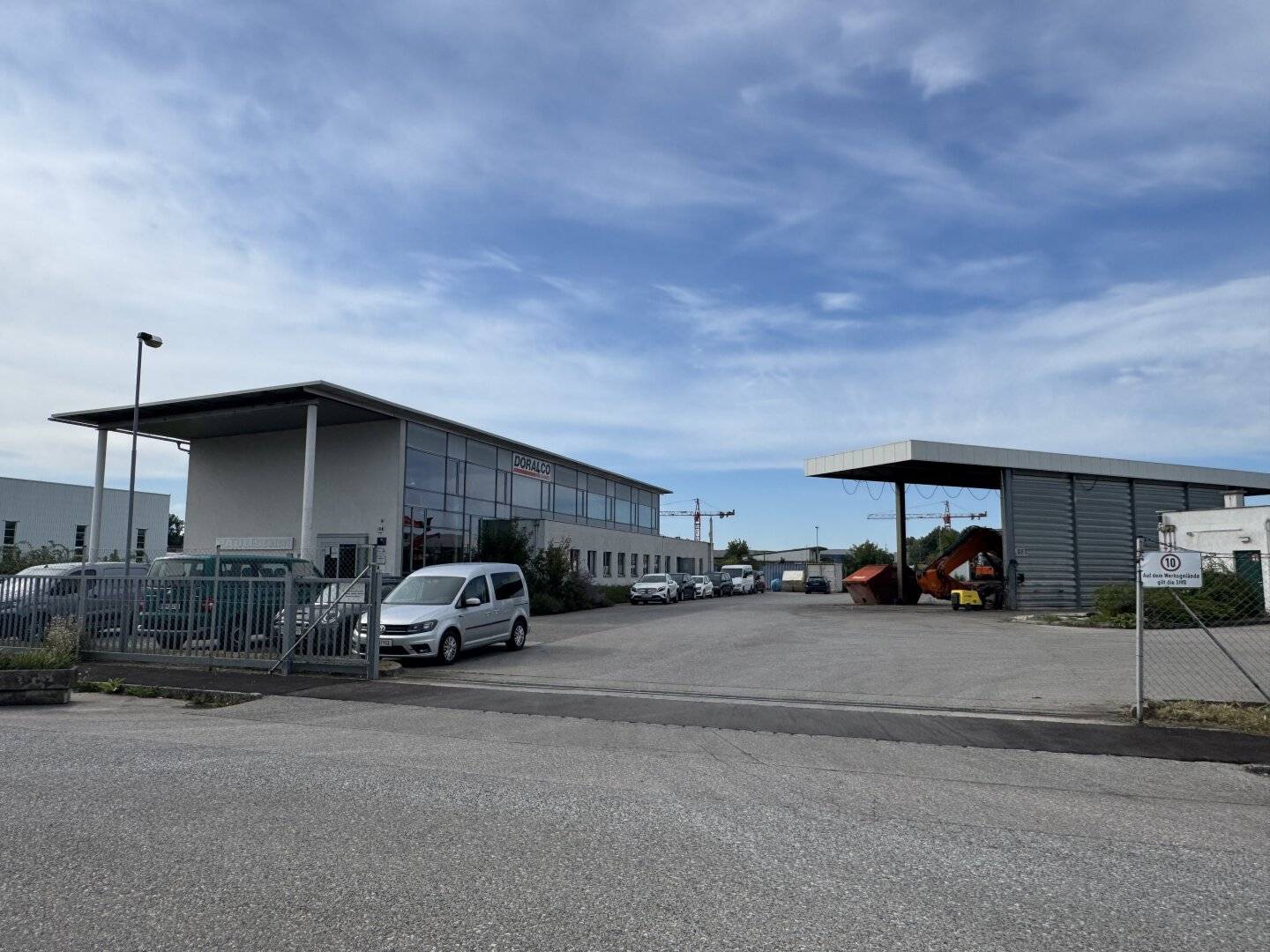 Office site with filling station and open space