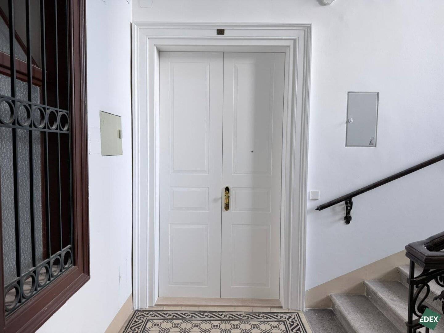 Renovated Altbau apartment with herringbone parquet and open kitchen