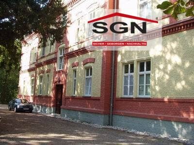 Gemütliche Erdgeschosswohnung mit Holzofen in grüner Lage