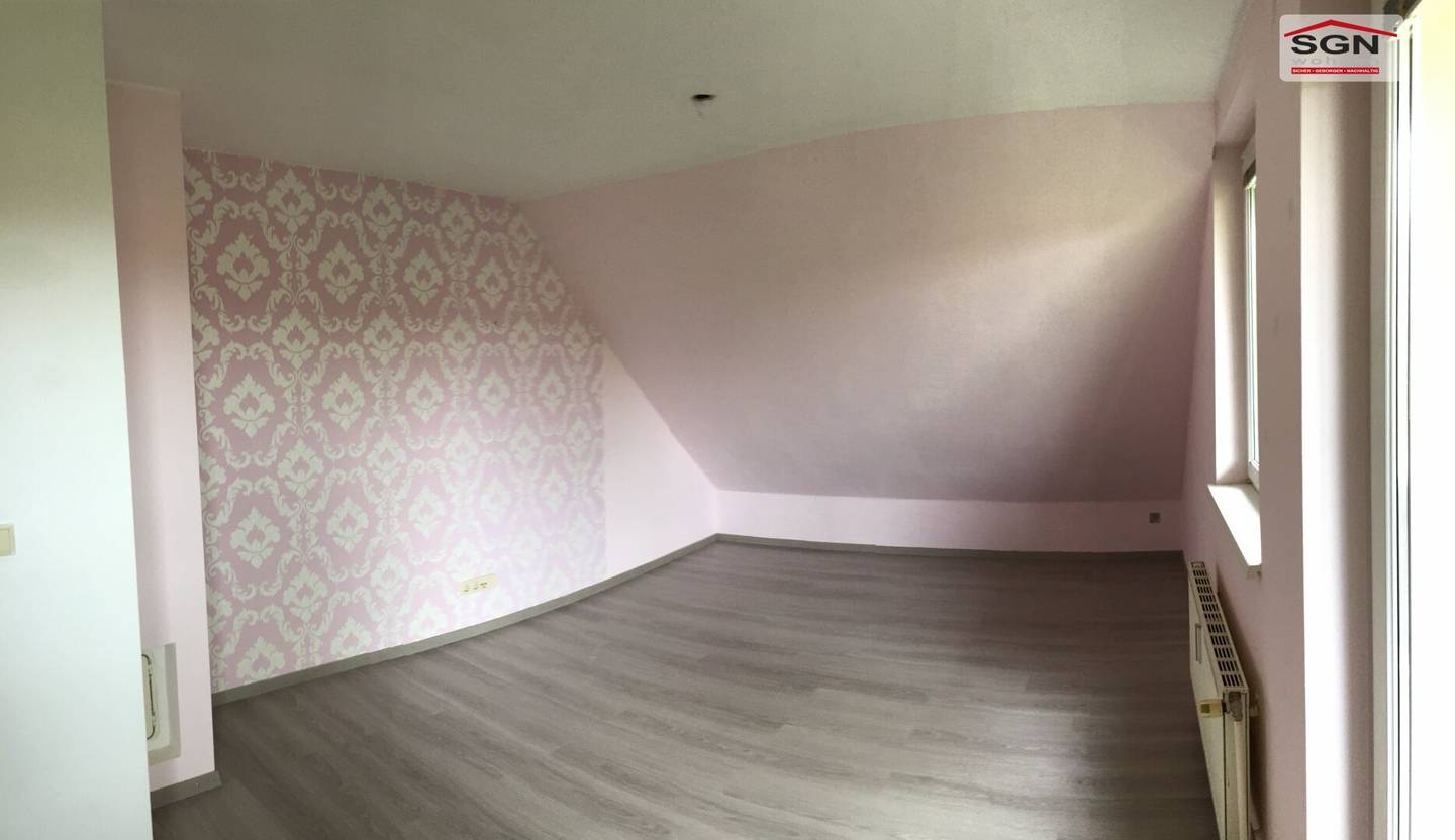 Attic apartment with balcony and cellar compartment