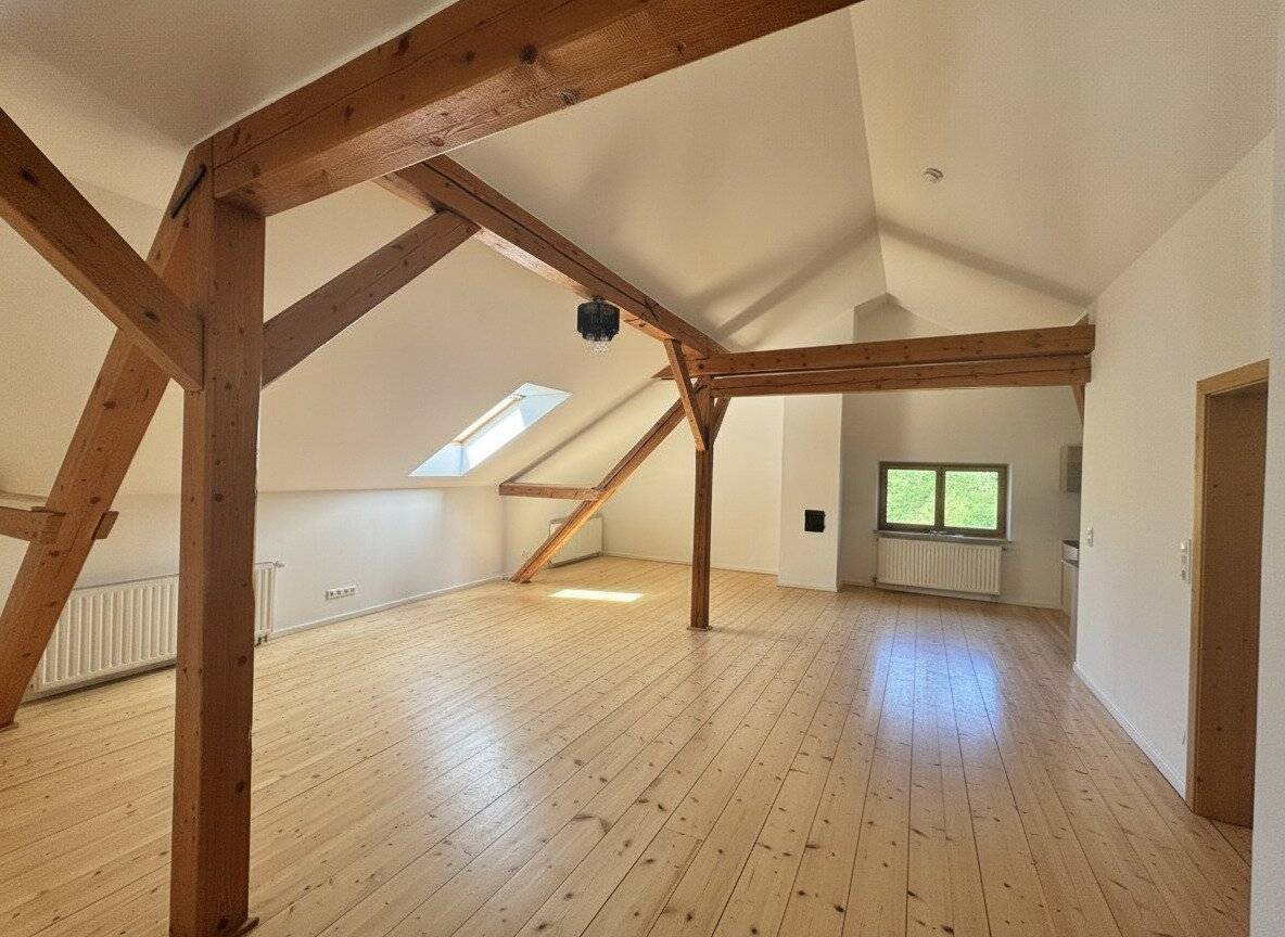 Loft apartment with parquet and fitted kitchen in a green quiet location