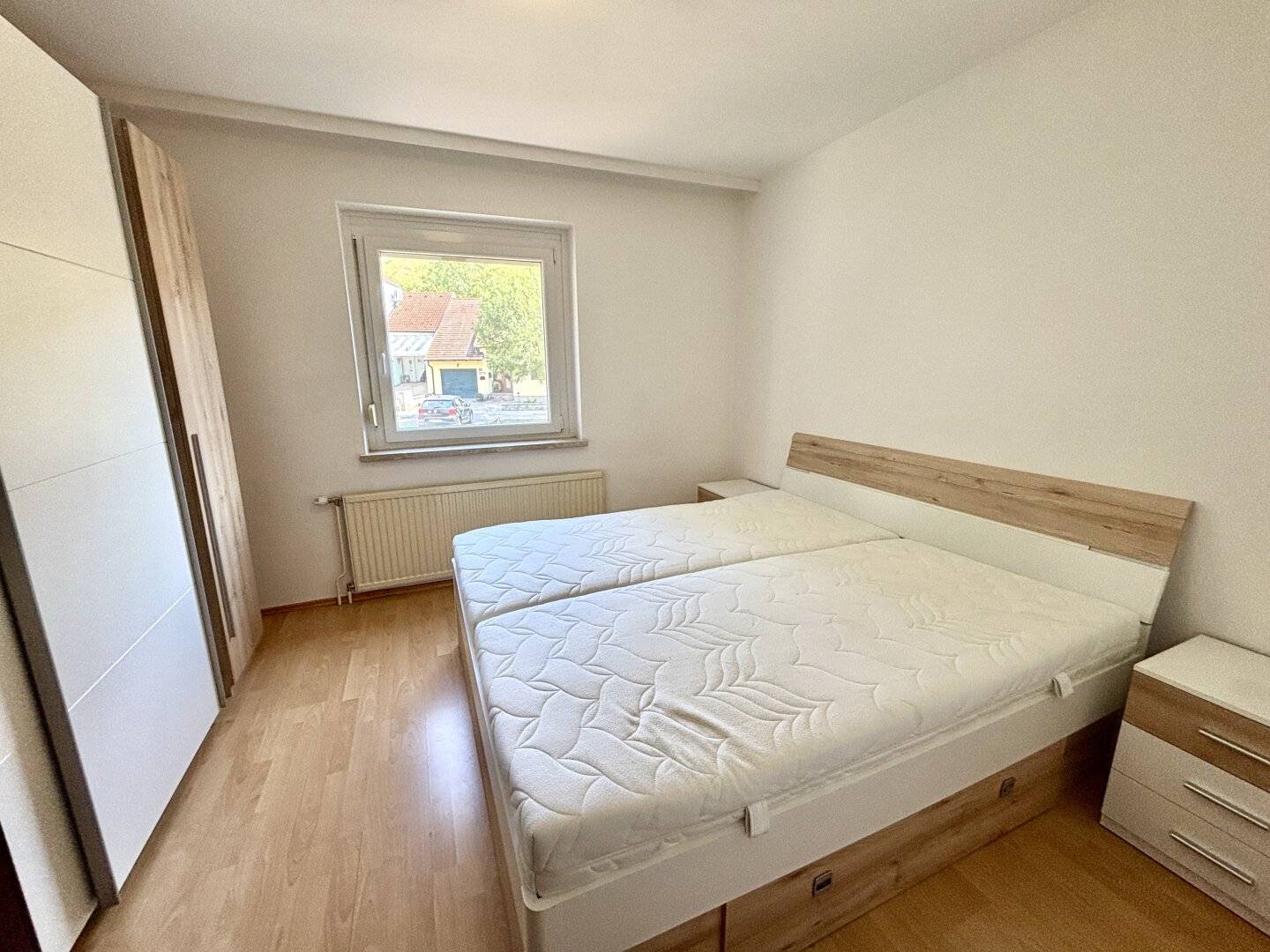 Renovierte Erdgeschosswohnung mit Loggia und Garage