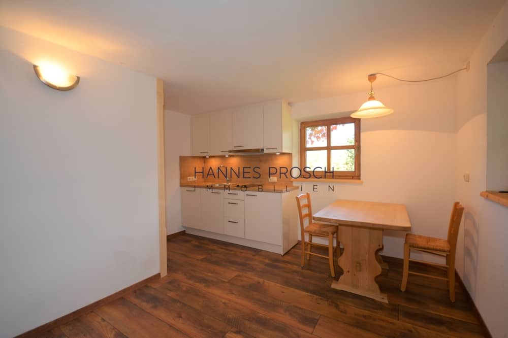 Basement apartment with open kitchen and storage in Jochberg