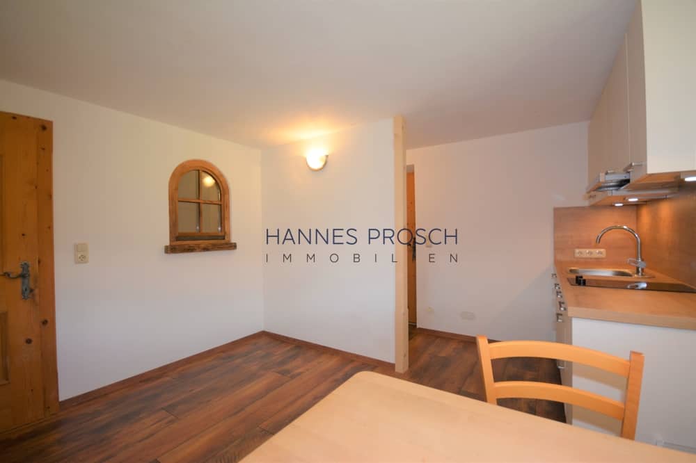 Basement apartment with open kitchen and storage in Jochberg