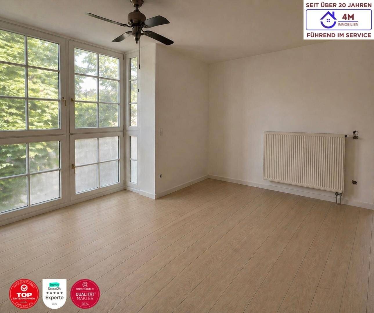 Helle Terrassenwohnung mit Privatgarten und Garage in Grünruhelage