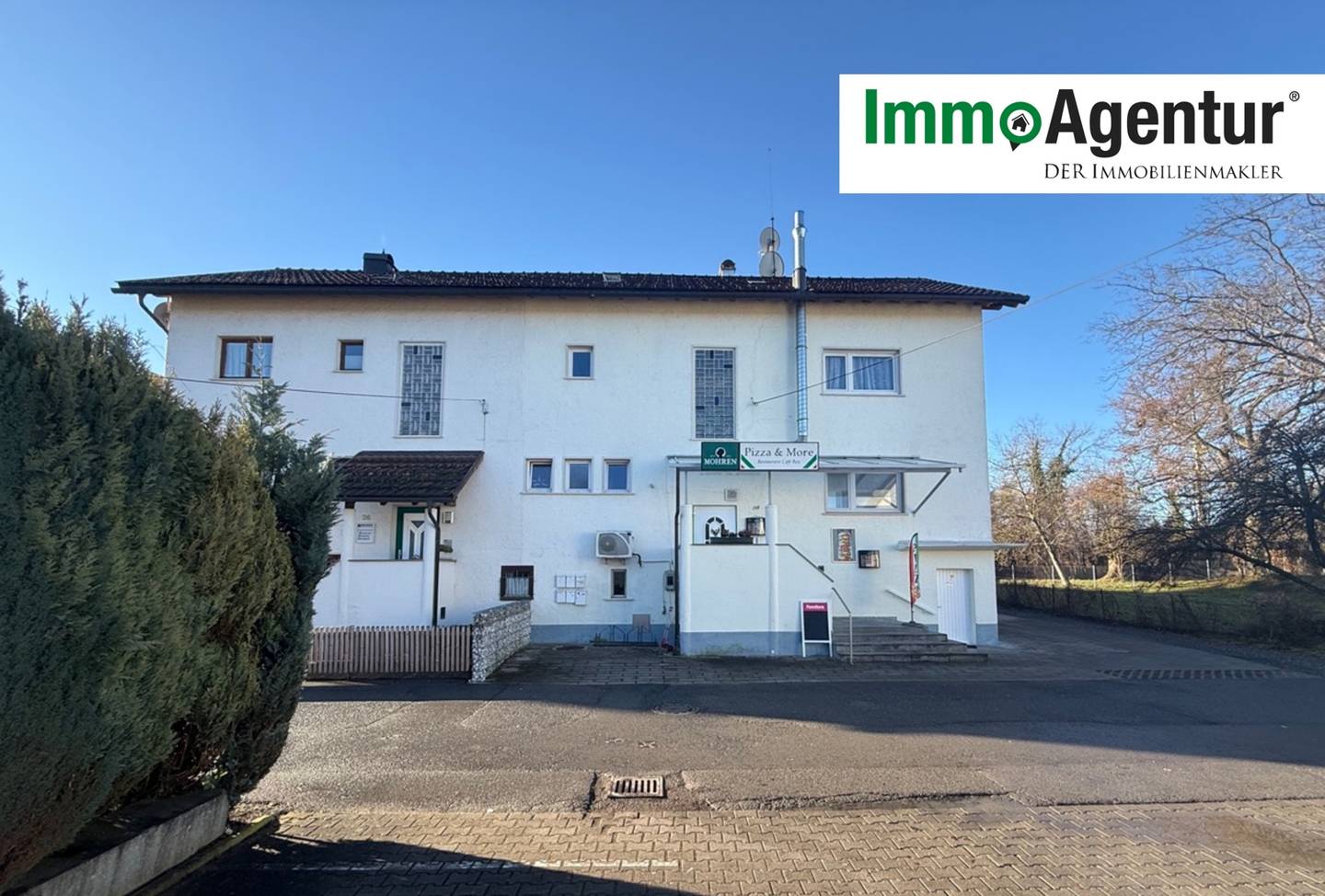 Mehrfamilienhaus mit Restaurant und Parkplatz in Bregenz