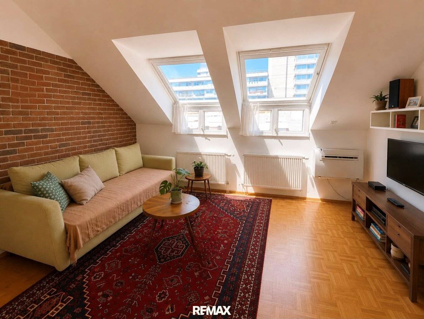 Charmante Dachgeschosswohnung mit Lift und Gemeinschaftsgarten