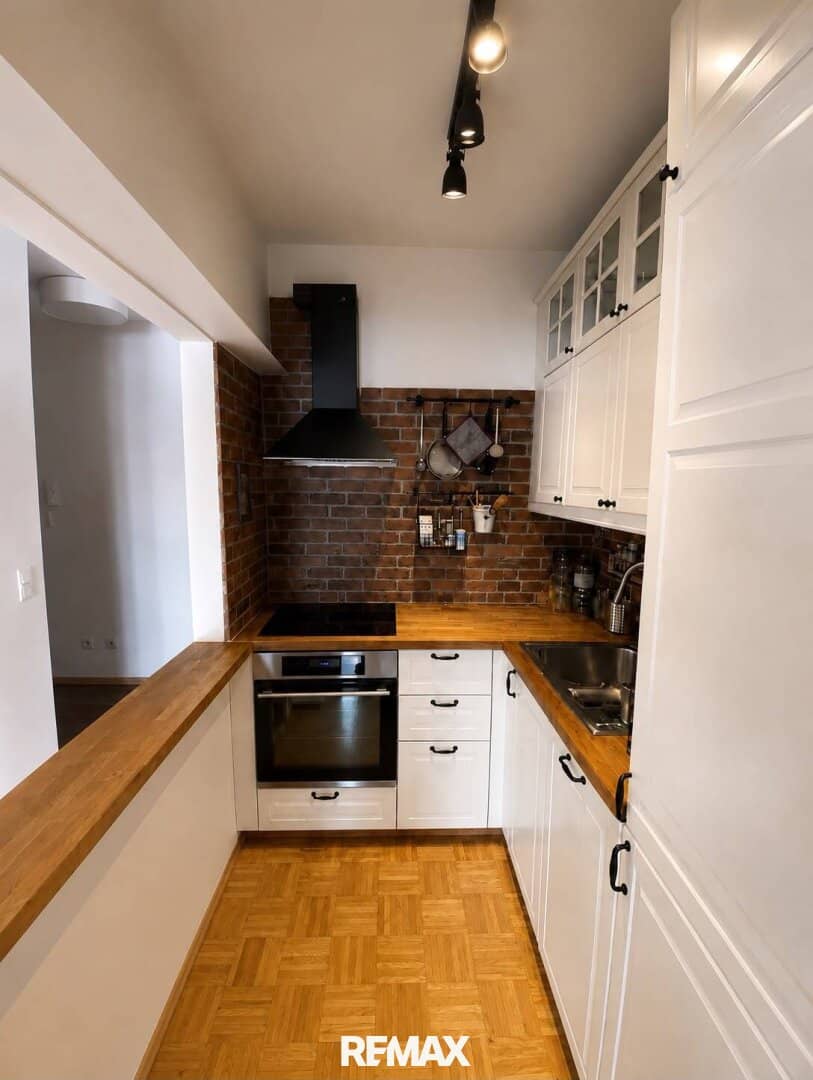 Charmante Dachgeschosswohnung mit Lift und Gemeinschaftsgarten