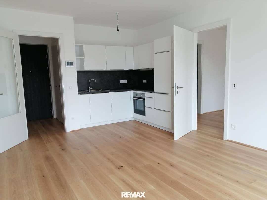 Moderne Neubauwohnung mit Balkon und Smart Home im Zentrum