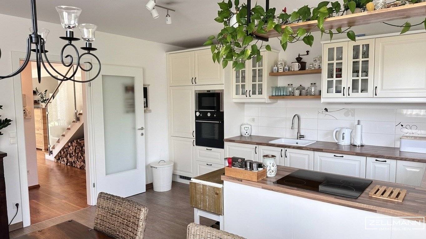 Modernes Wohnen am Grünrand Wiens – elegantes Haus mit Südgarten nahe den Maurer Weinbergen | ZELLMANN IMMOBILIEN