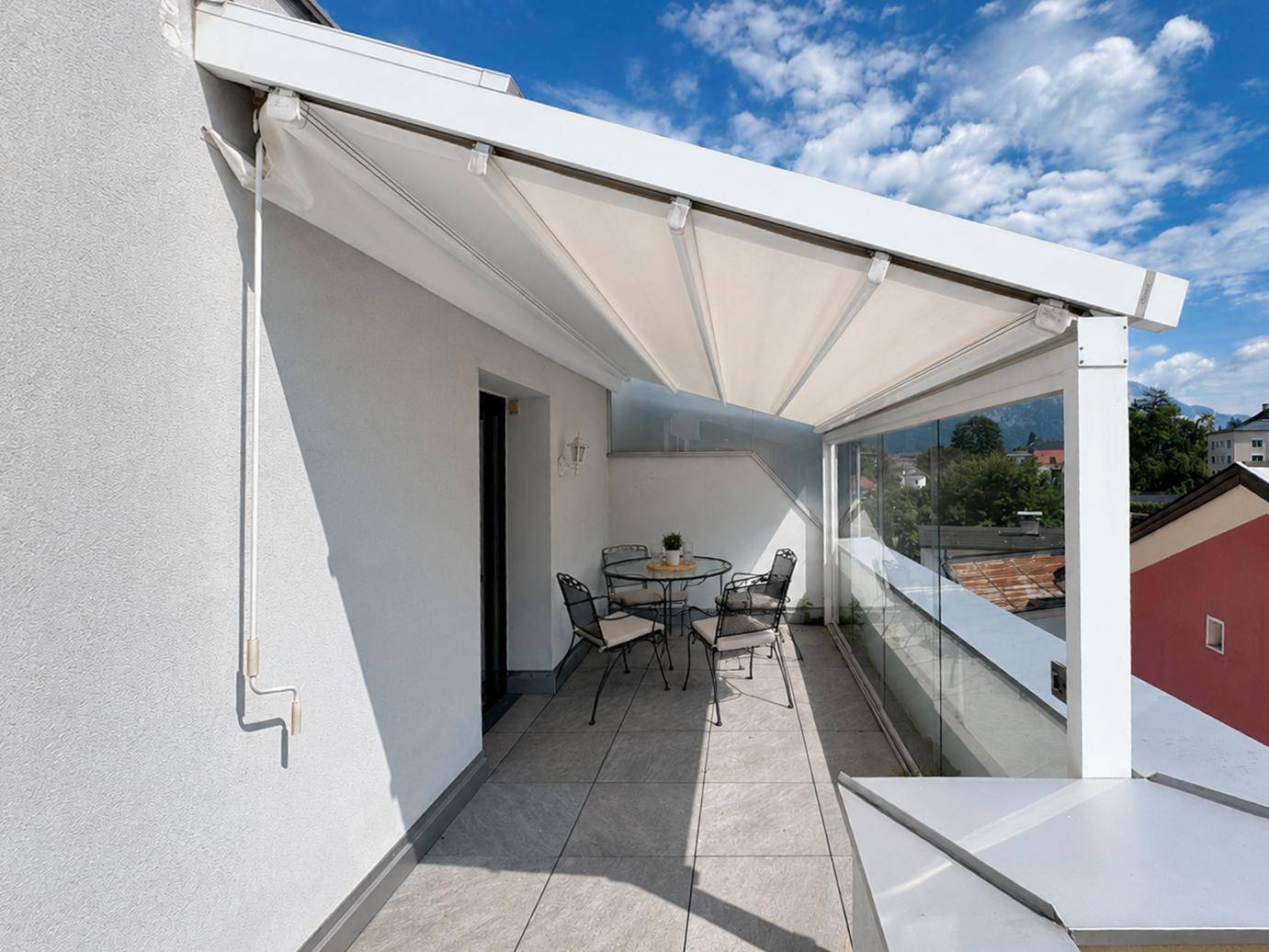 Dachgeschosswohnung mit sonniger Dachterrasse und Bergblick