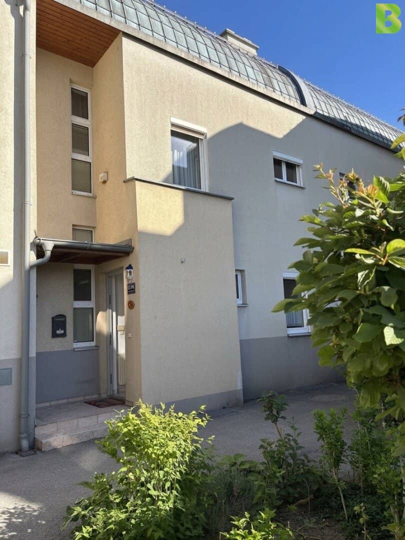Row house with garden and tiled stove in quiet location