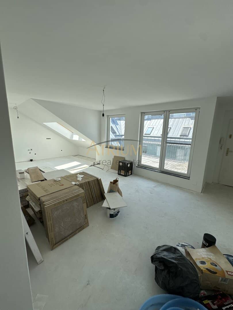 Dachgeschosswohnung mit Terrasse Balkon und Fußbodenheizung