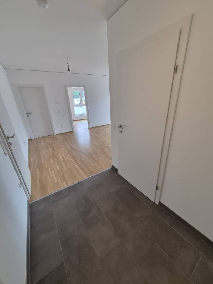 Neubauwohnung mit Eigengarten und Terrasse