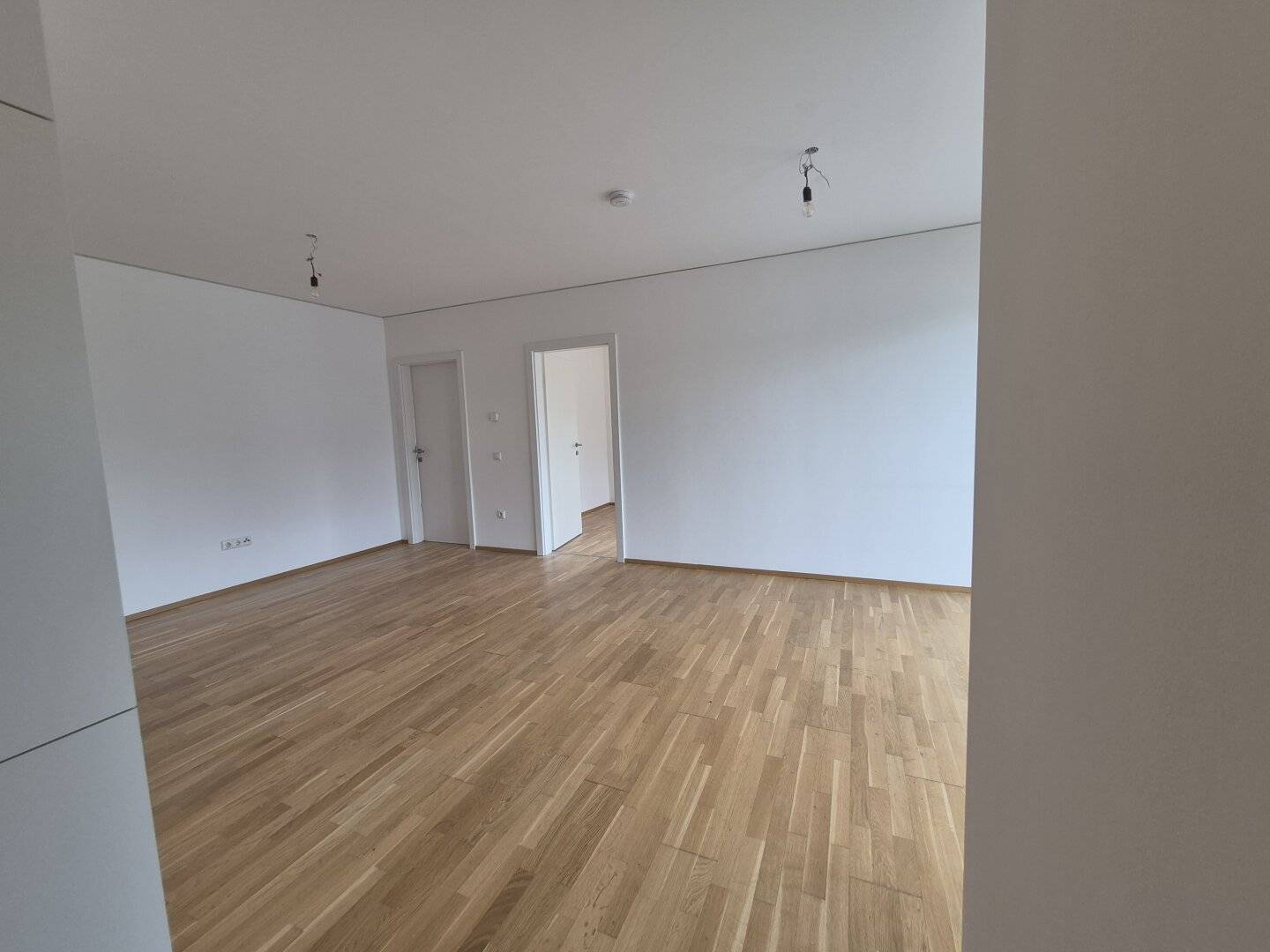 Neubauwohnung mit Eigengarten und Terrasse