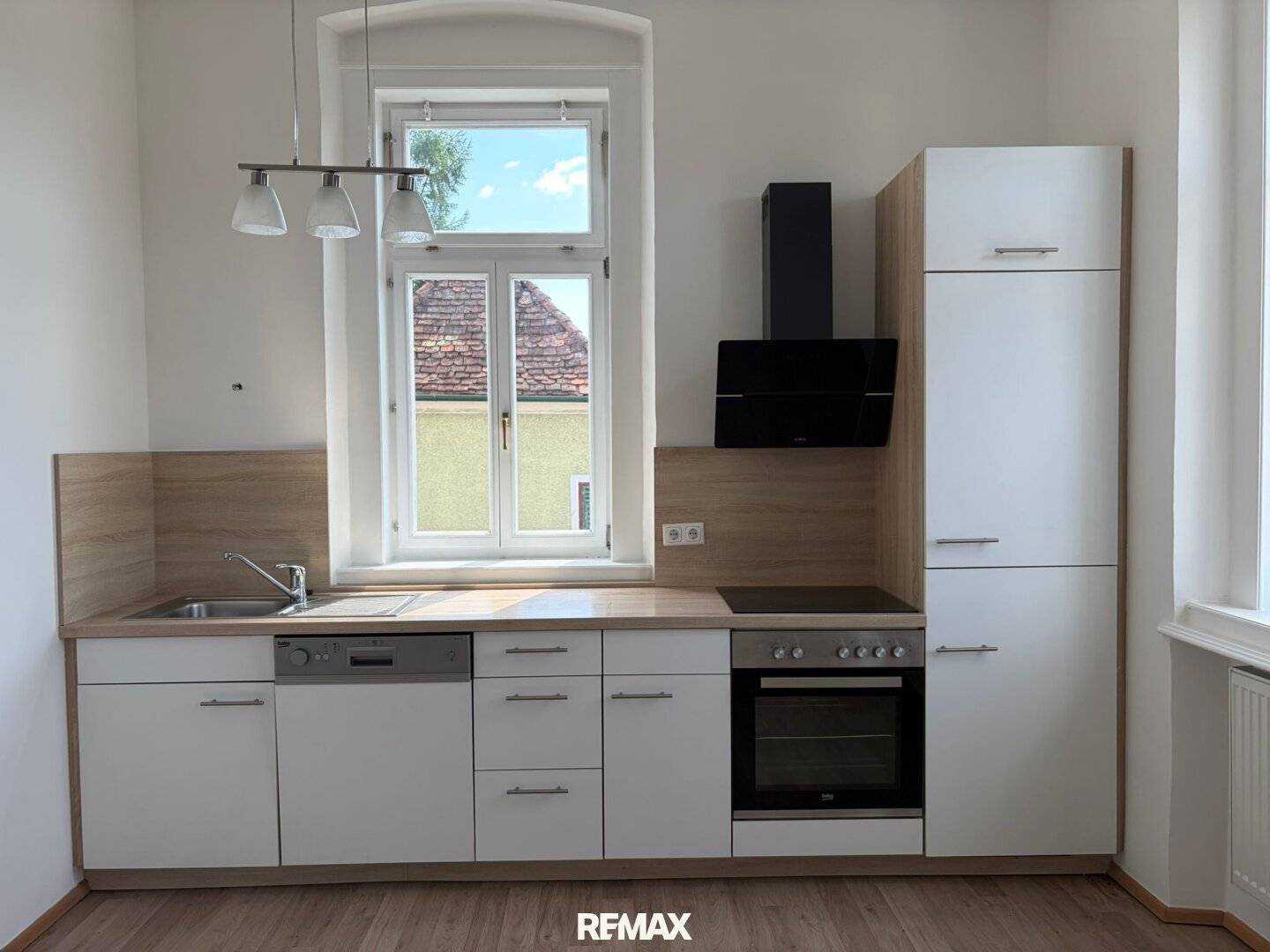Renovierte Wohnung mit Dachterrasse in zentraler Lage