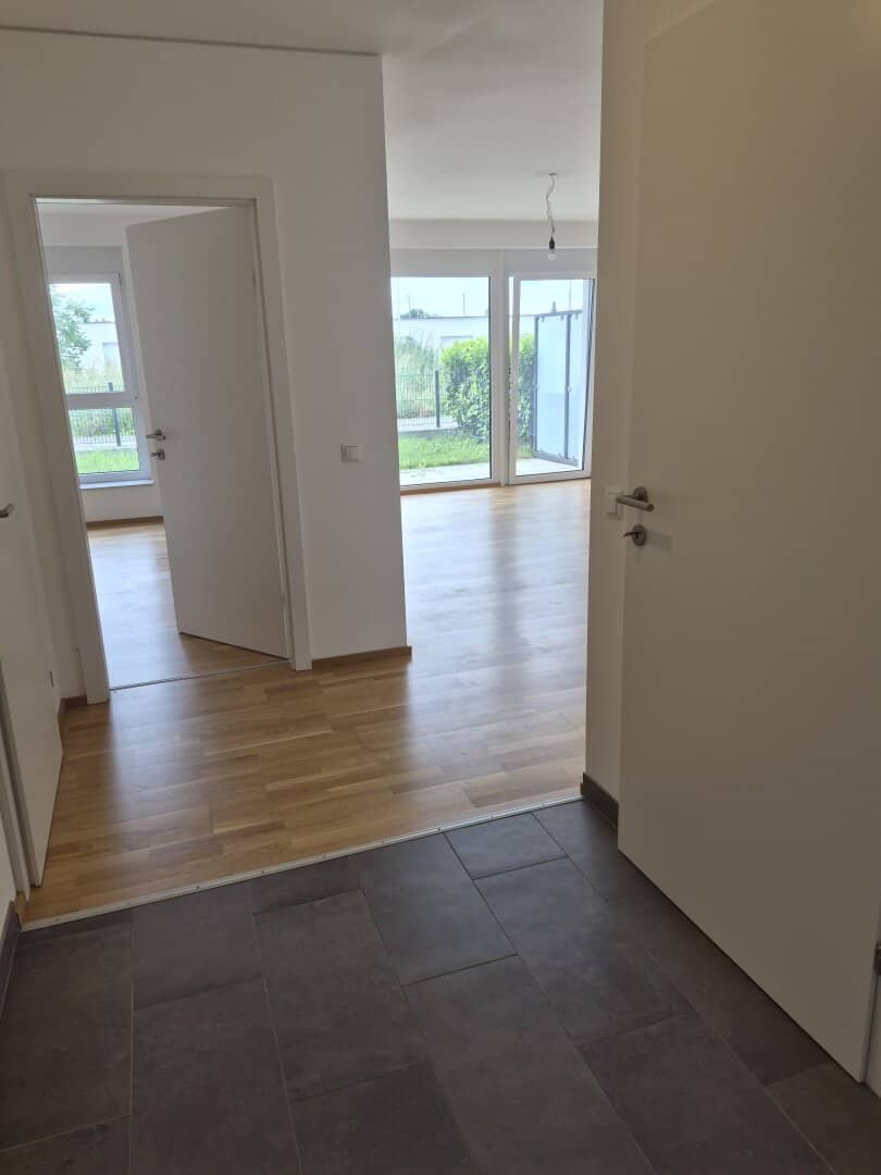 Neubauwohnung mit Garten und Terrasse