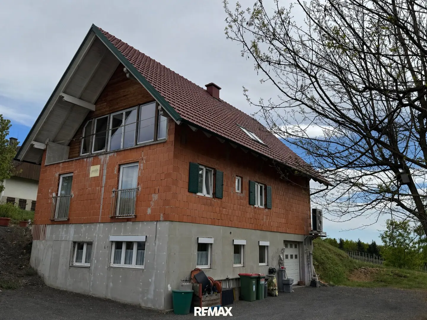 Charming house in sunny hillside location with terrace and distant view