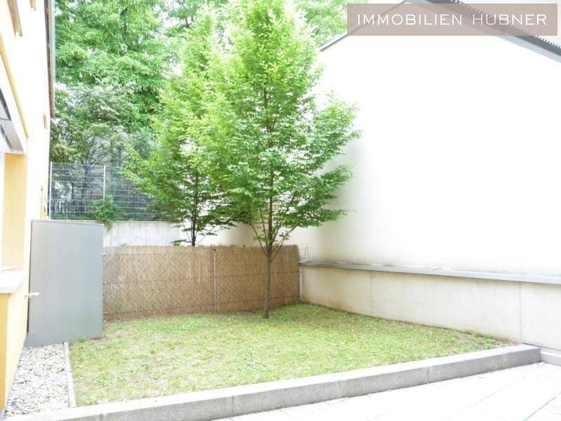 Modern ground floor apartment with garden and terrace