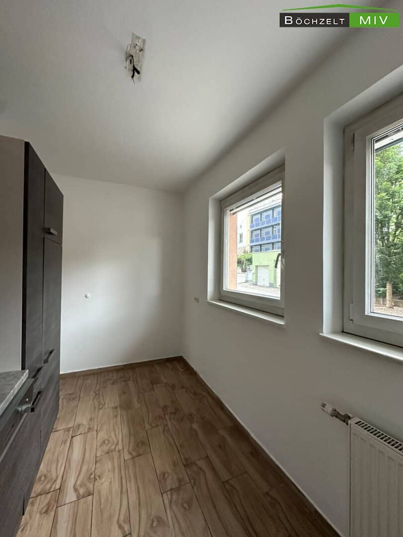Helle Etagenwohnung mit Balkon in zentraler Lage