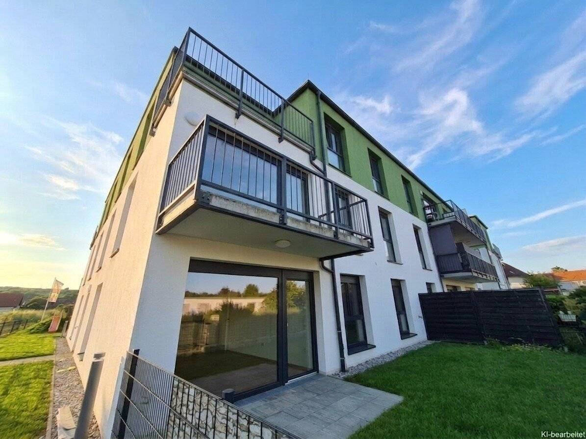 Neubauwohnung mit Garten und Terrasse