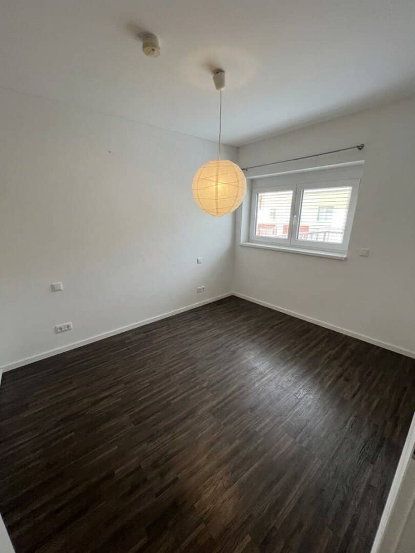 Helle Dachgeschosswohnung mit Balkon und Stellplatz