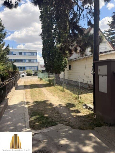 Well maintained single family home with garage and garden plot