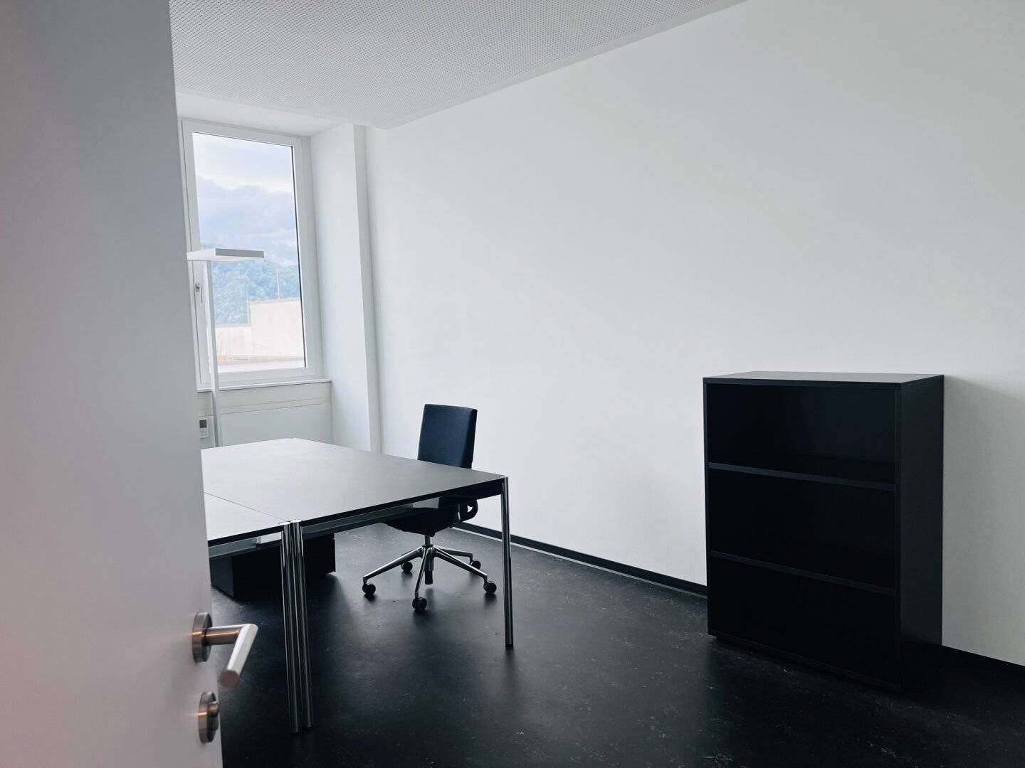 Modern Office in STADTWERK High-Rise with Workstations