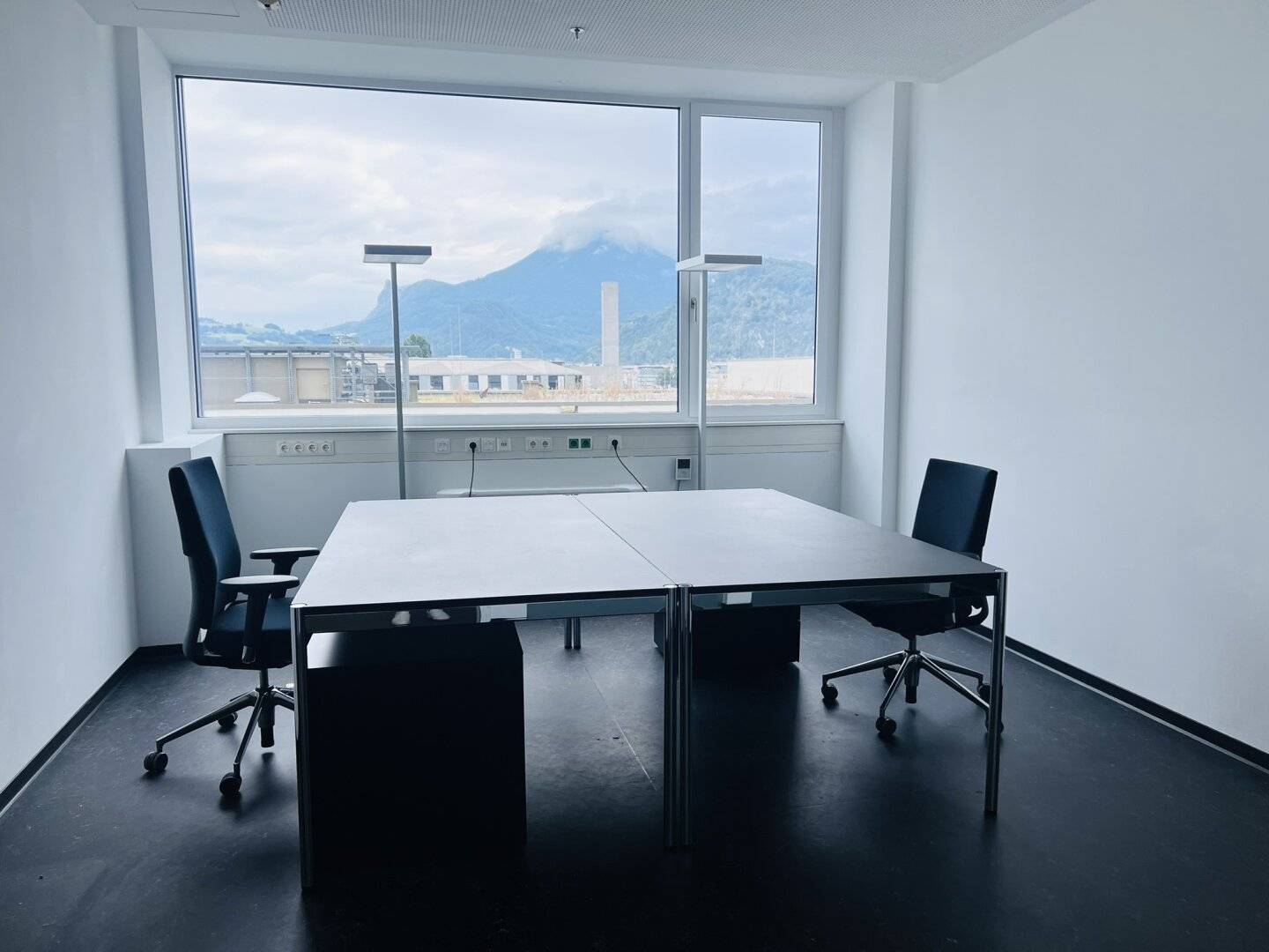 Modern Office in STADTWERK High-Rise with Workstations