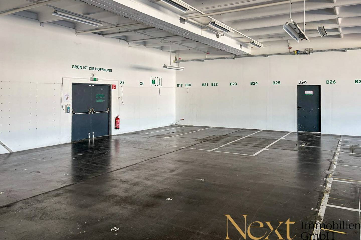 Spacious warehouse with freight elevator and parking spaces