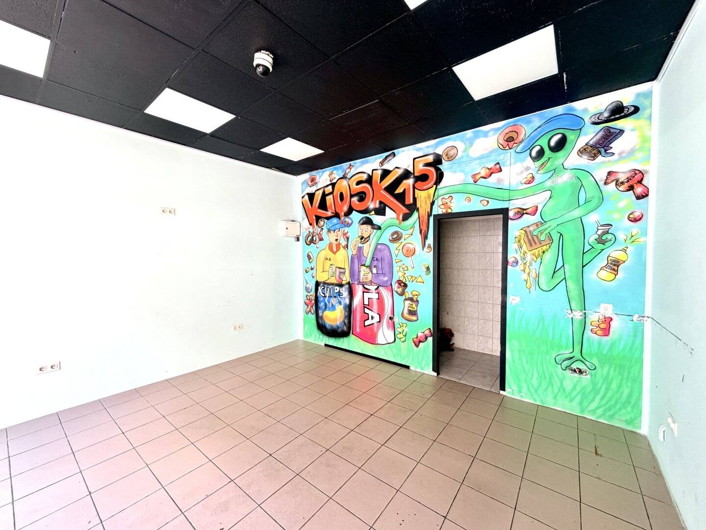 Small commercial space with large storefront windows in a good location