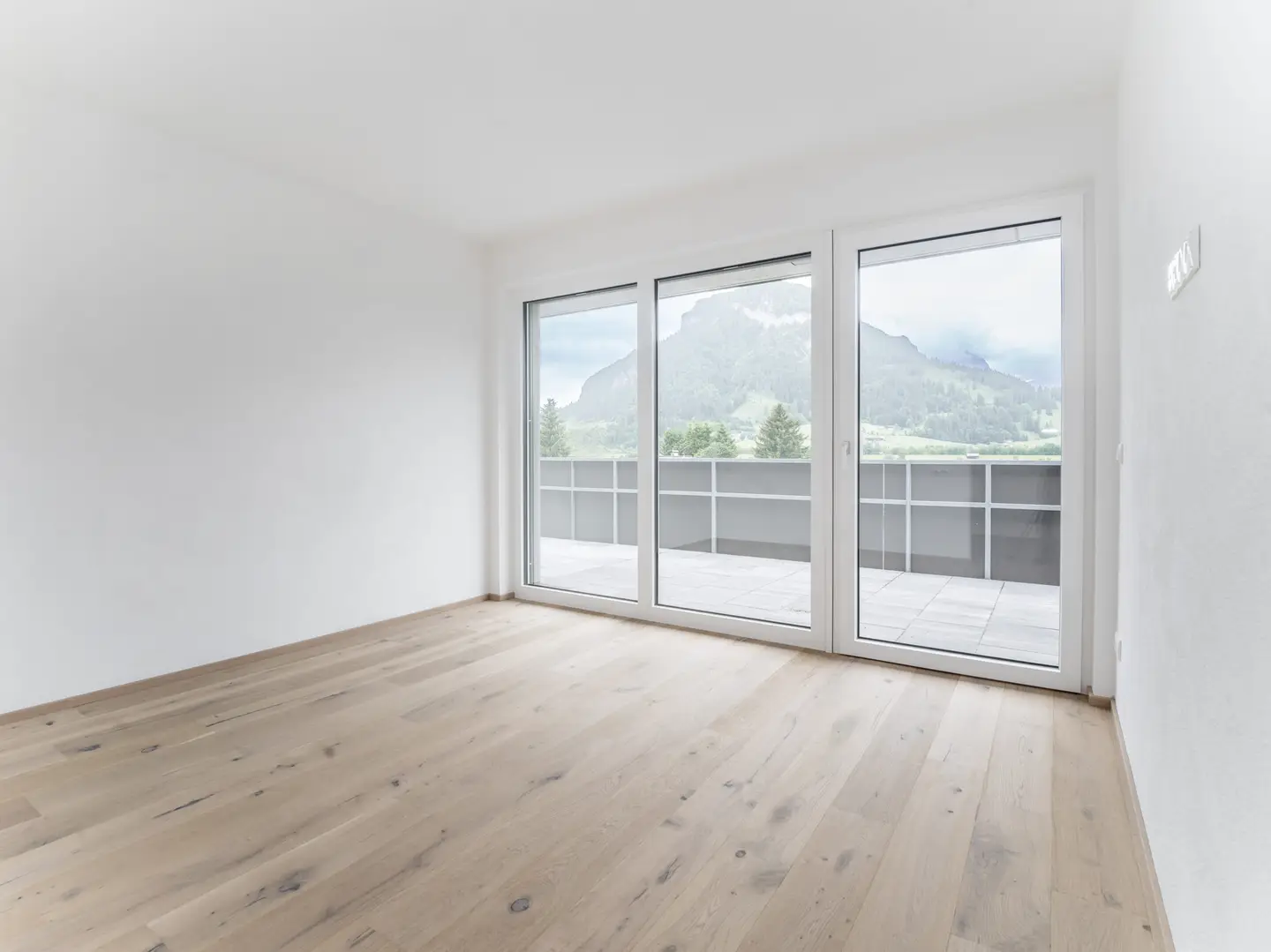 Modern apartment with balcony and mountain view