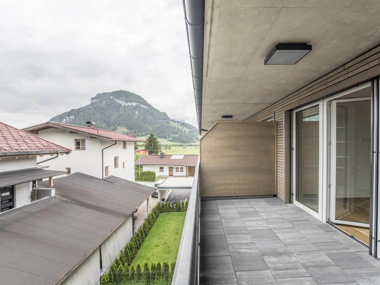 Modern apartment with balcony and mountain view