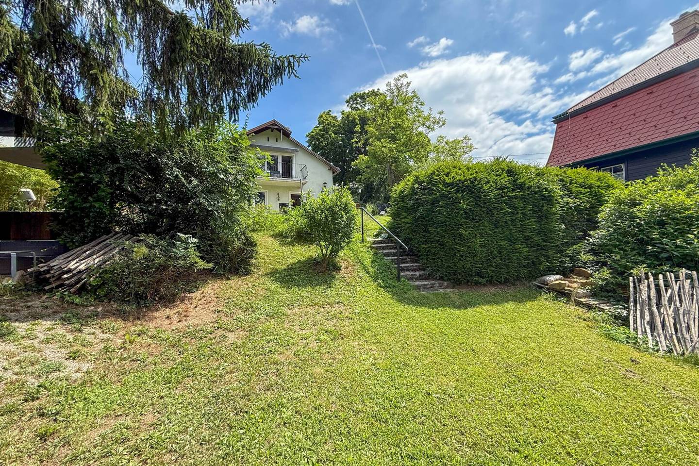 Charming house with southwest plot and division potential